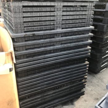 stacked plastic pallets