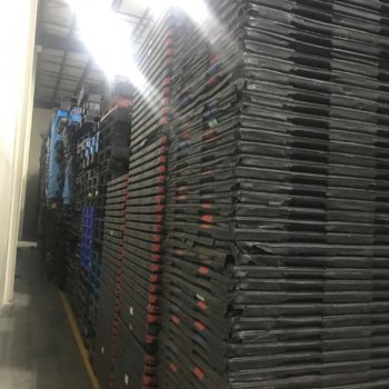 stacked plastic pallets for recycling